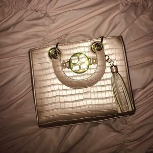 Iman pink crocodile print bag